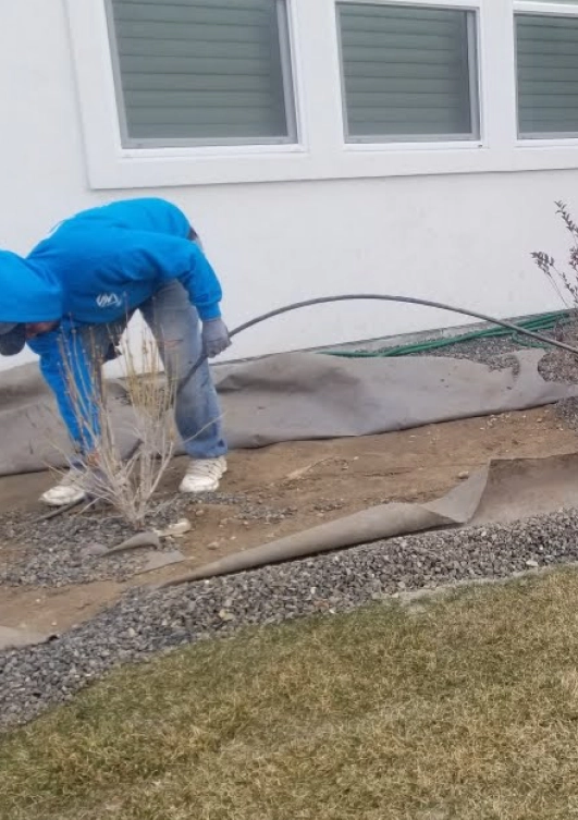 about us concrete path driveway service front yard man workingnampa id
